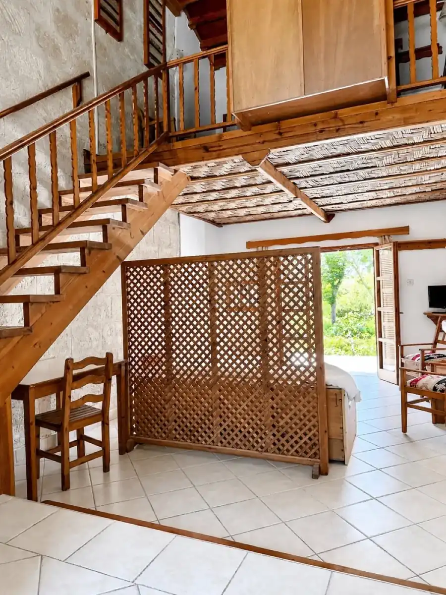 Poolside Bungalow loft stairs and lattice