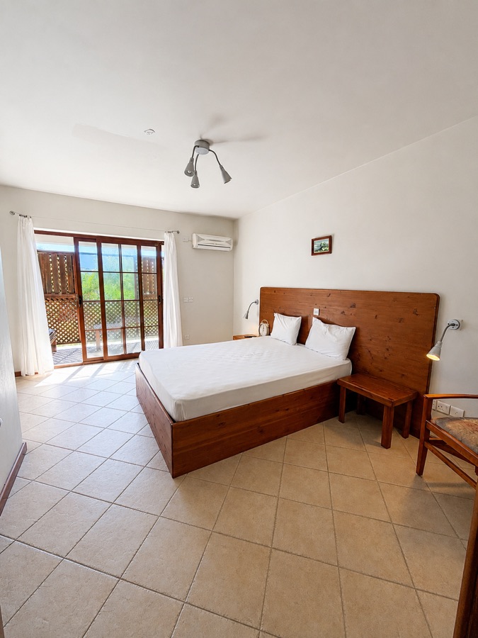 Partial Sea View Hotel Room wide bedroom